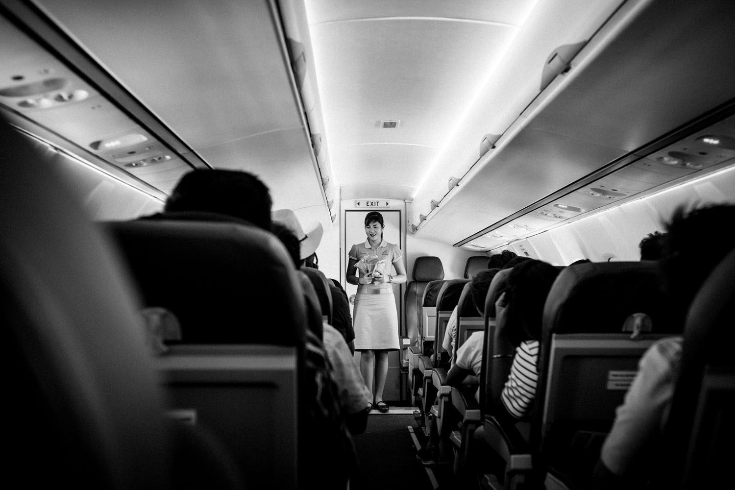 IN FLIGHT. Alexa Zenica Chua, 21-year-old flight attendant for Cebu Pacific. A graduate of the Ateneo de Zamboanga, her Cebu Pacific stint is her first job. Photo by Rick Rocamora