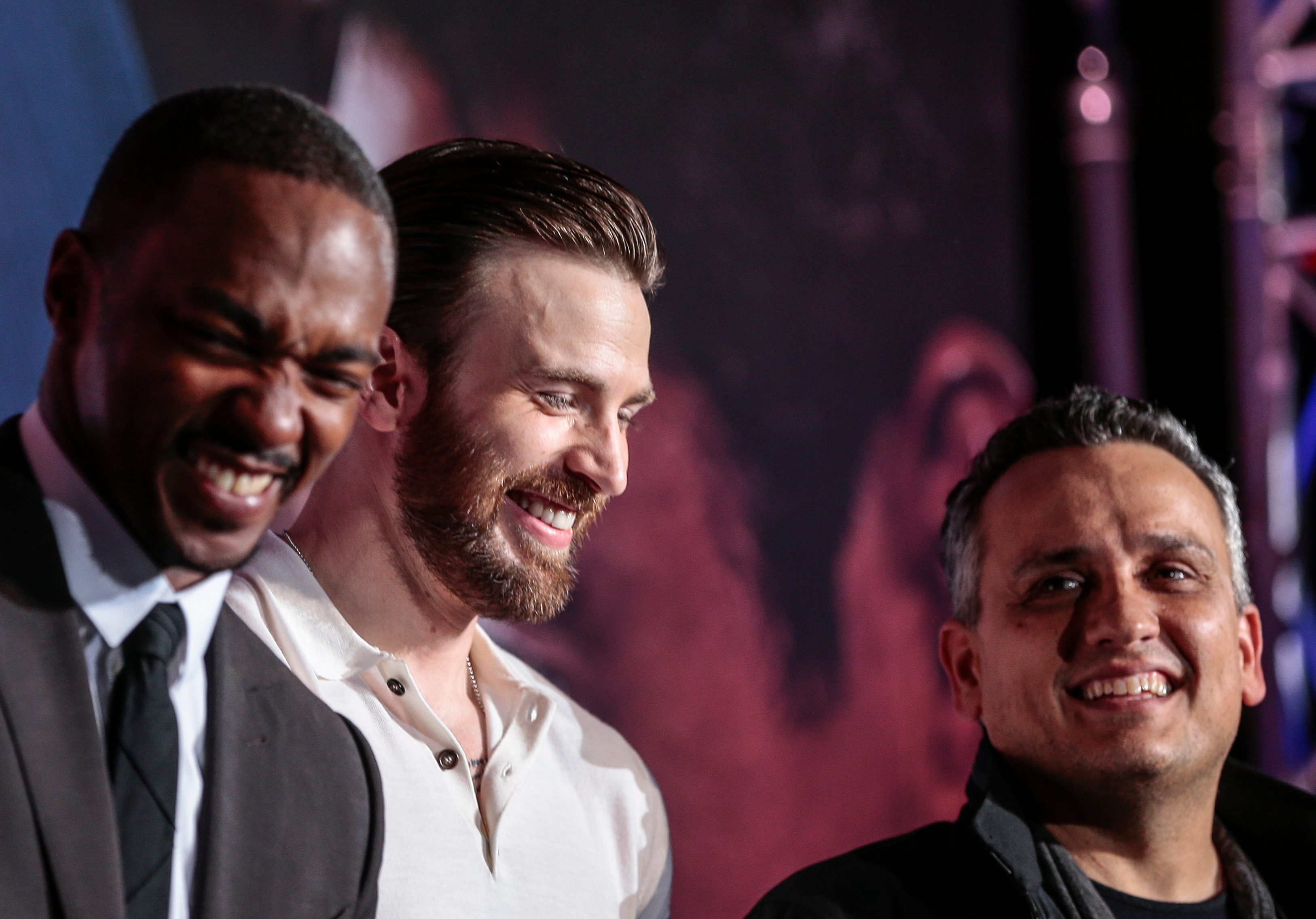BLUE CARPET. Chris Evans, Anthony Mackie, and director Joe Russo at the premiere of 'Captain America: Civil War' in Singapore. Photo by Wallace Woon/EPA  