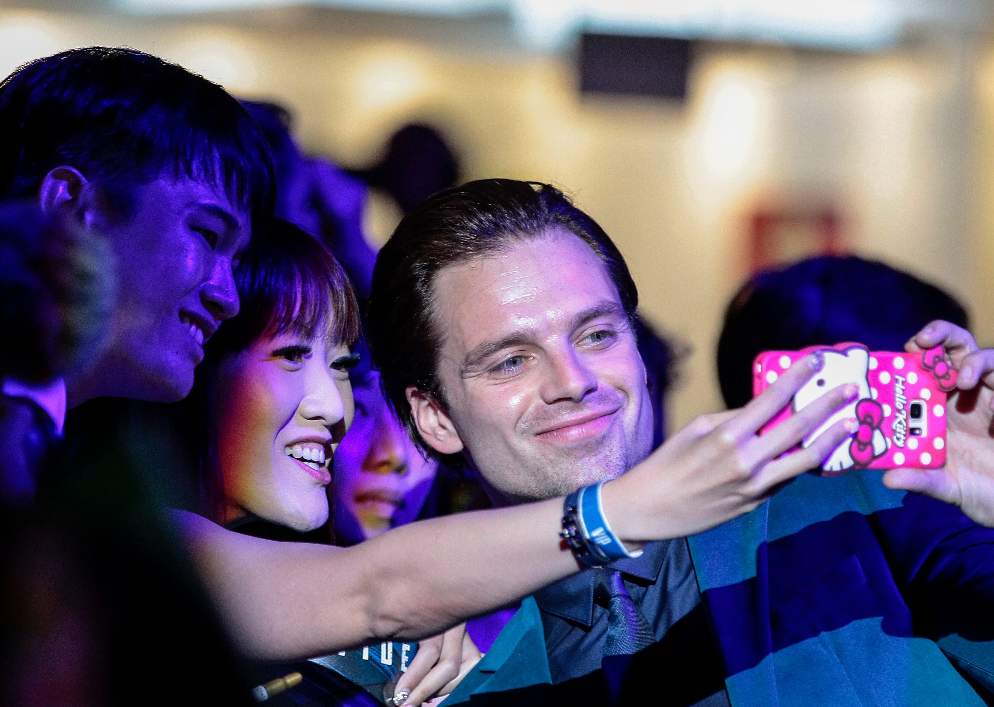 Sebastian Stan with a fan at the 'Civil War' premiere. Photo by Wallace Woon/EPA 