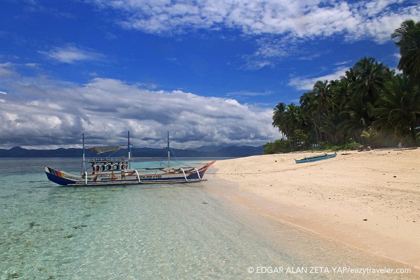 BLUE SKIES, CLEAR WATER. Visit the immaculate shores of Olanivan while island-hopping