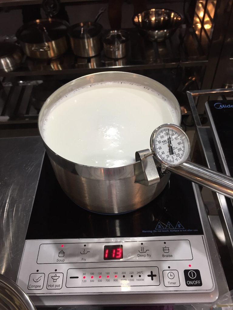 WAITING GAME. Heating up the milk takes patience... and a reliable thermometer. 
