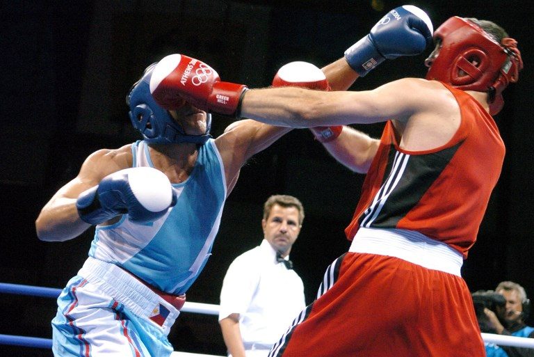 The last loss for Christopher Camat (L) came against Gaydarbek Gaydarbekov (R), also the last boxer to defeat Gennady Golovkin at the 2004 Olympics. Photo by Joe Klamar/AFP 