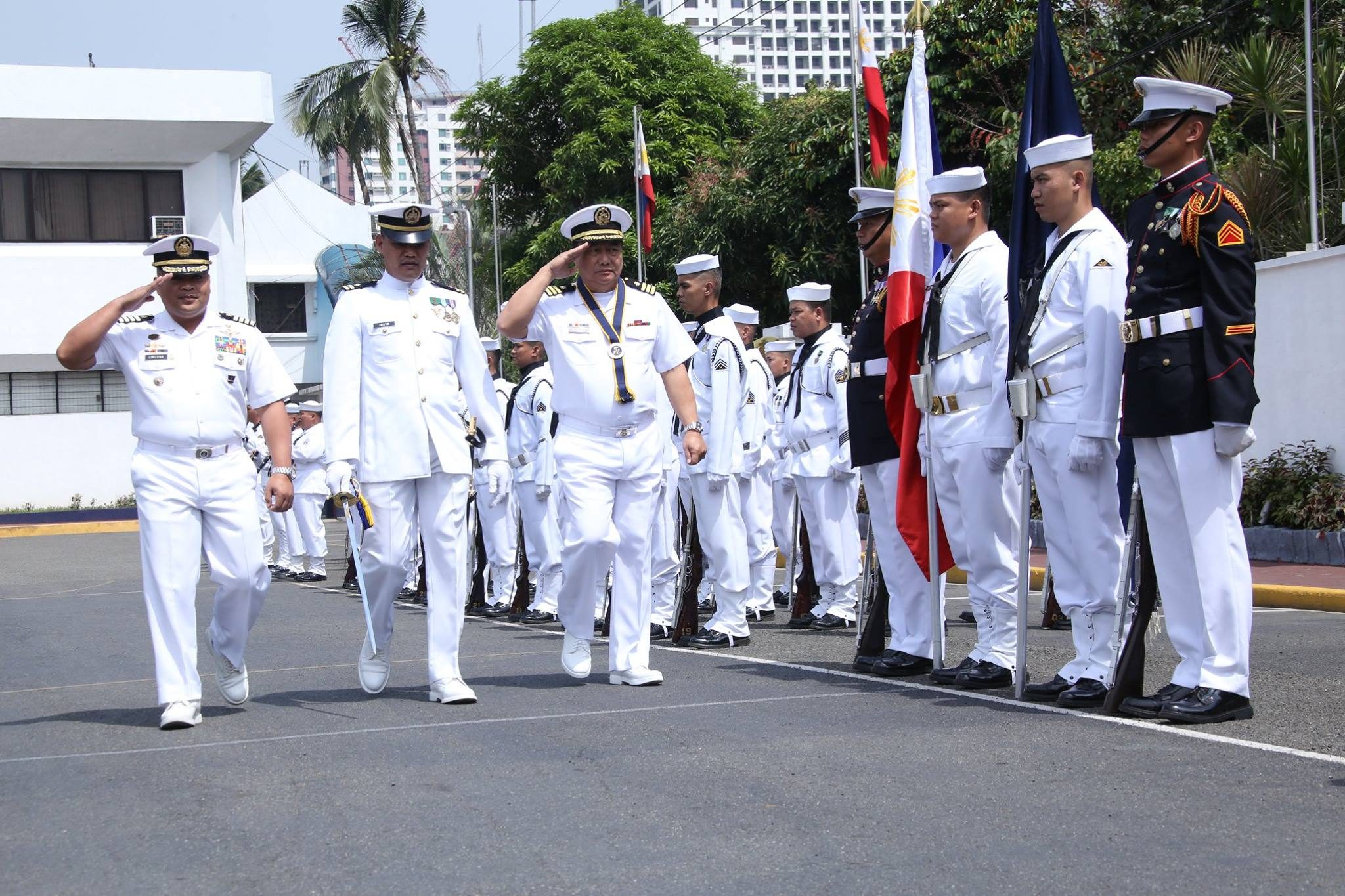 MILITARY HONORS. Members of the Philippine Navy give Alvarez military honors after his donning of ranks ceremony. Photo from the Philippine Navy's Facebook page 