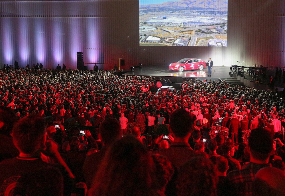 STAR OF THE SHOW. Elon Musk (onstage) speaks during the delivery event for the Tesla Model 3 in California, July 28, 2017. Photo courtesy Tesla Motors 