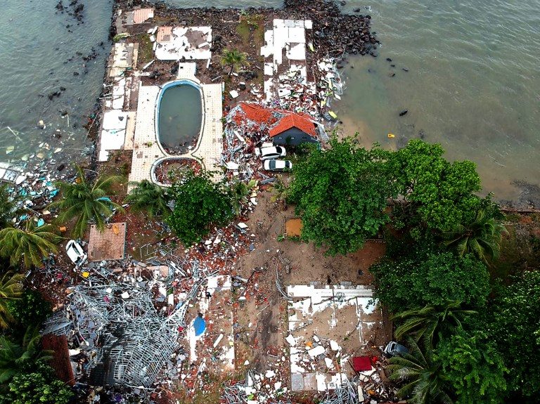 MASSIVE DAMAGE. An aerial photo shows damaged buildings in Carita. Photo by Azwar Ipank/AFP  