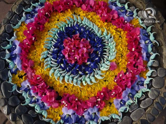 BURSTS OF COLOR. Baker’s Hill has several flower art displays like this, and even stone mosaic art 