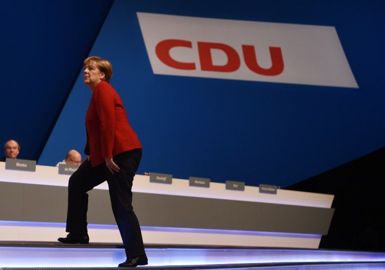 Weakened Merkel embarks on tough German election campaign