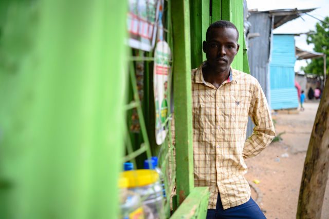 NO NATIONAL ID. Hamdi Mohamed Mahamoud at his duka (shop) in Garissa. He must rely on proceeds from his kiosk, unable to obtain formal employment without a national ID. Photo by Klein Ongaki
 