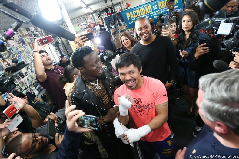Like old times, Pacquiao holds court at Wild Card