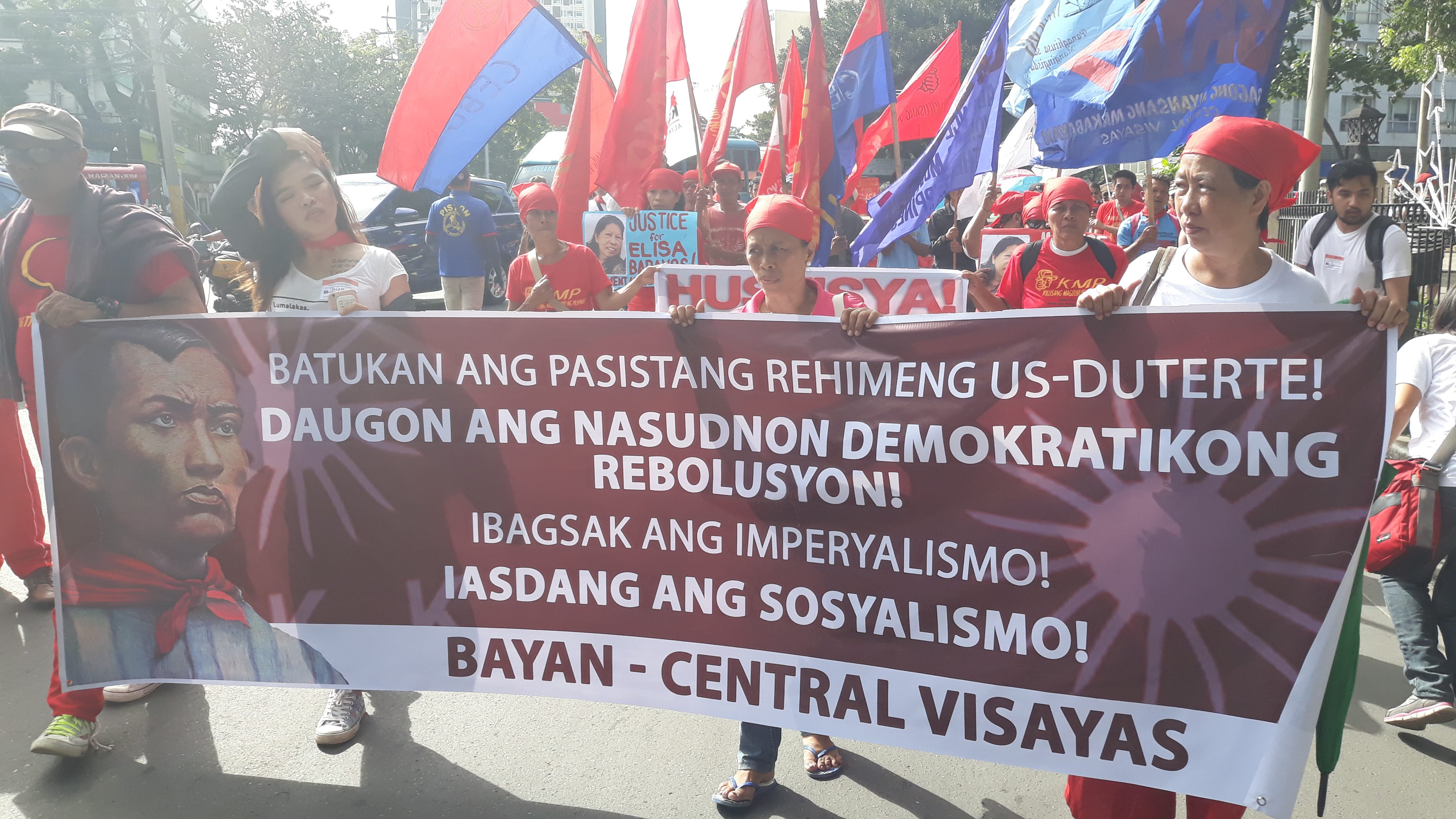 WIN THE REVOLUTION. Bayan Muna members begin their march from Fuente Osmeña to Colon Street in Cebu City. Photo by Mars W. Mosqueda Jr  