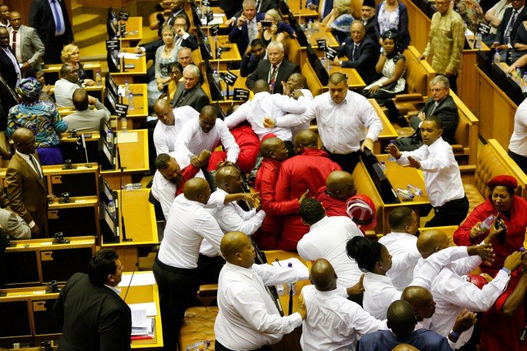 Fistfight in South African parliament as guards eject lawmakers