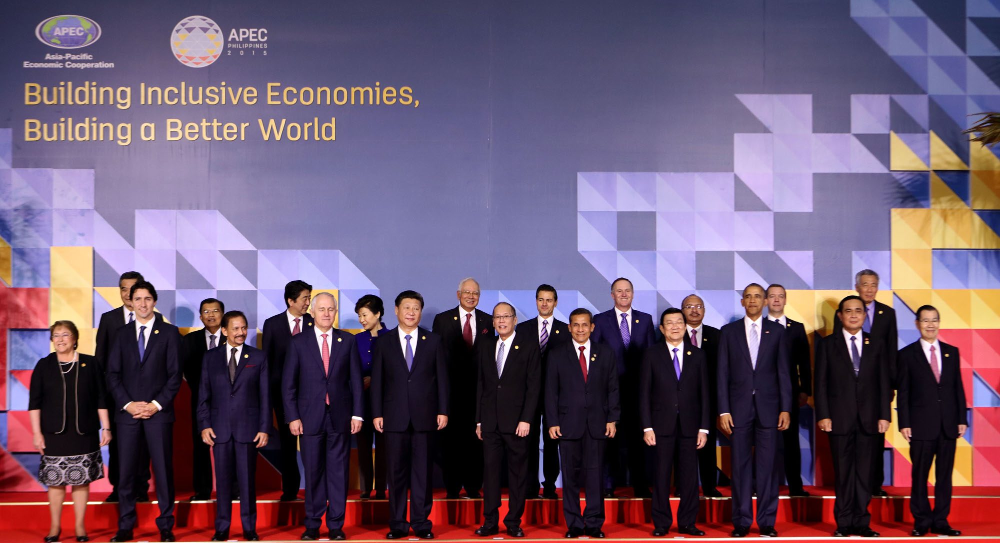 APEC 2015 chairman President Benigno S. Aquino III (6th from left) joins fellow APEC leaders (from left, front row): Republic of Chile President Michelle Bachelet; Canadian Prime Minister Justin Trudeau; Brunei Darussalam Prime Minister Sultan Hassanal Bolkiah; Commonwealth of Australia Prime Minister Malcolm Turnbull; People's Republic of China President Xi Jinping; Republic of Peru President Ollanta Humala; Socialist Republic of Vietnam President Truong Tan Sang; United States of America President Barack Obama; Kingdom of Thailand Prime Minister General Prayut Chan-o-Cha; and Chinese Taipei former Vice President Vincent Siew. (Back row, from left) Hong Kong Chief Executive CY Leung; Republic of Indonesia Vice President Jusuf Kalla; Japanese Prime Minister Shinzo Abe; Republic of Korea President Park Geun-hye; Malaysian Prime Minister Najib Razak; United Mexican States President Enrique Peña Nieto; New Zealand Prime Minister John Key; Independent State of Papua New Guinea Prime Minister Peter O'Neill; Russian Federation Prime Minister Dmitry Medvedev; and Republic of Singapore Prime Minister Lee Hsien Loong. Photo by Rey Baniquet / Malacañang Photo Bureau  