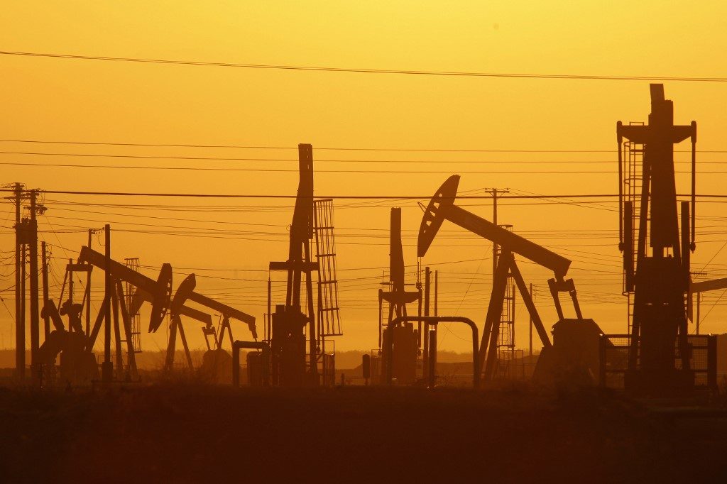 OIL. Pump jacks are seen at dawn in an oil field over the Monterey Shale formation near Lost Hills, California, on March 24, 2014. File photo by David McNew/Getty Images/AFP 
