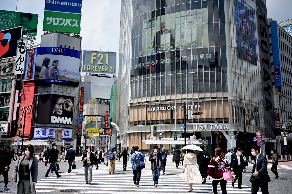 Japan passes $240-billion virus package including cash handouts