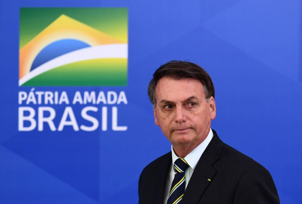Bolsonaro tells rally Brazil lockdown destroying jobs
