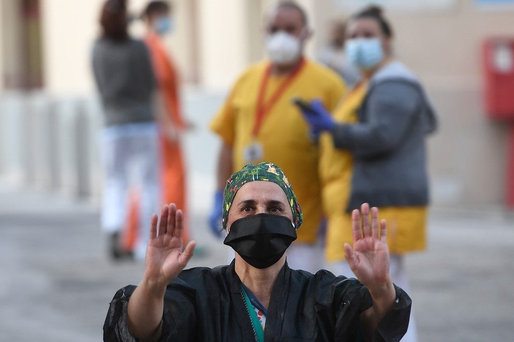 Spain eases lockdown as hopes of pandemic peak rise