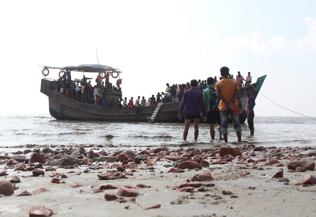 Bangladesh rescues nearly 400 Rohingya after weeks at sea