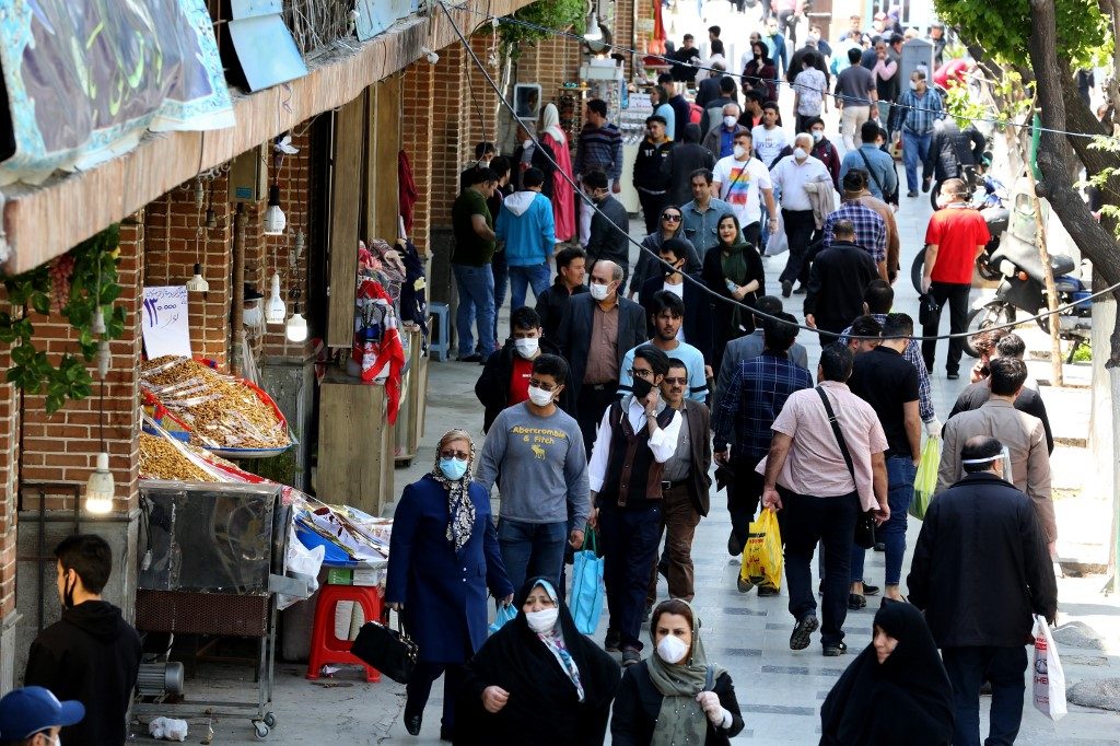 Tehran cautiously reopens as economic hardship trumps virus risks