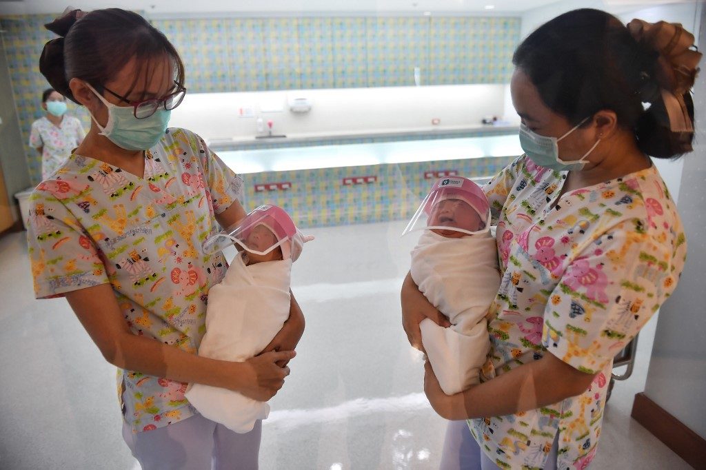 Thai hospitals protect babies born in a pandemic with face shields