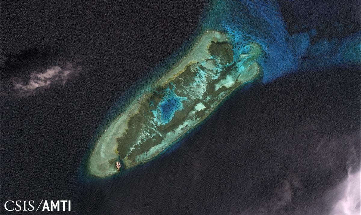 ORIGINAL STATE. This was Kagitingan Reef (Fiery Cross Reef) before China started reclaiming it in 2015. Photo from CSIS-AMTI 