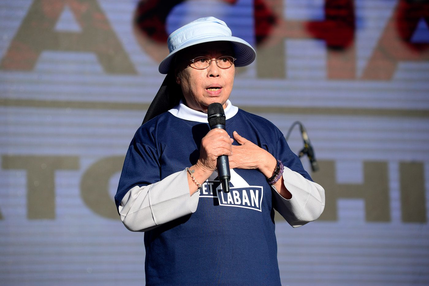 Sister Mary John Mananzan takes the stage at the rally. Photo by Maria Tan/Rappler 