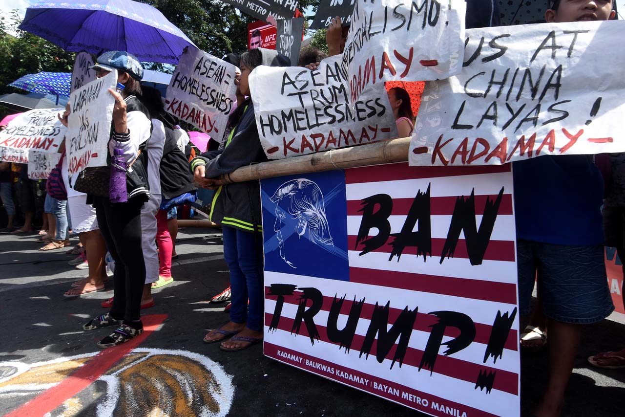 NOT WELCOME. Ahead of the gathering of world leaders in Metro Manila for the ASEAN summit, militant groups stage a series of protests on November 10, 2017. Photo by Angie de Silva/Rappler  