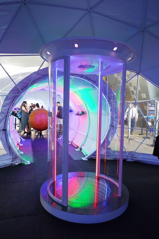 BEAM ME UP. The teleporter booth uses lights and mirrors to mimic space travel.  
