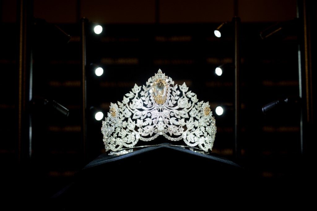 POWER OF UNITY CROWN.  The 'Power of Unity'crown is crafted in 18-karat gold, handset with more than 1770 diamonds including a magnificent centerpiece shield-cut golden canary diamond weighing 62.83-carats. The crown marks the first collaboration between Mouawad and Miss Universe. Photo by Marcus Ingram/Getty Images for Endeavor/AFP 