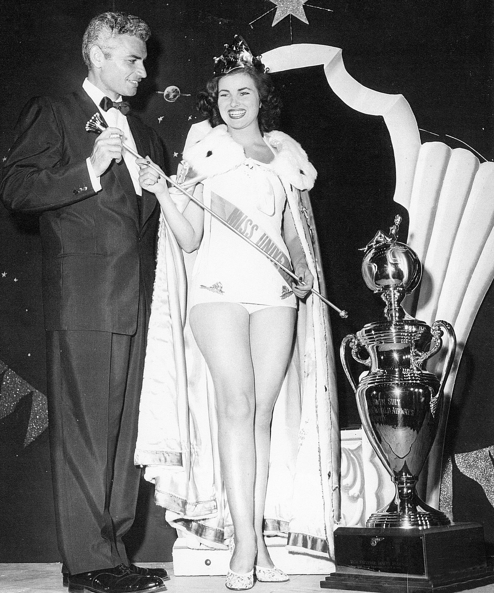 MISS UNIVERSE 1953. France's Christiane Martel poses with judge Jeff Chandler. Photo from Miss Universe Organization  