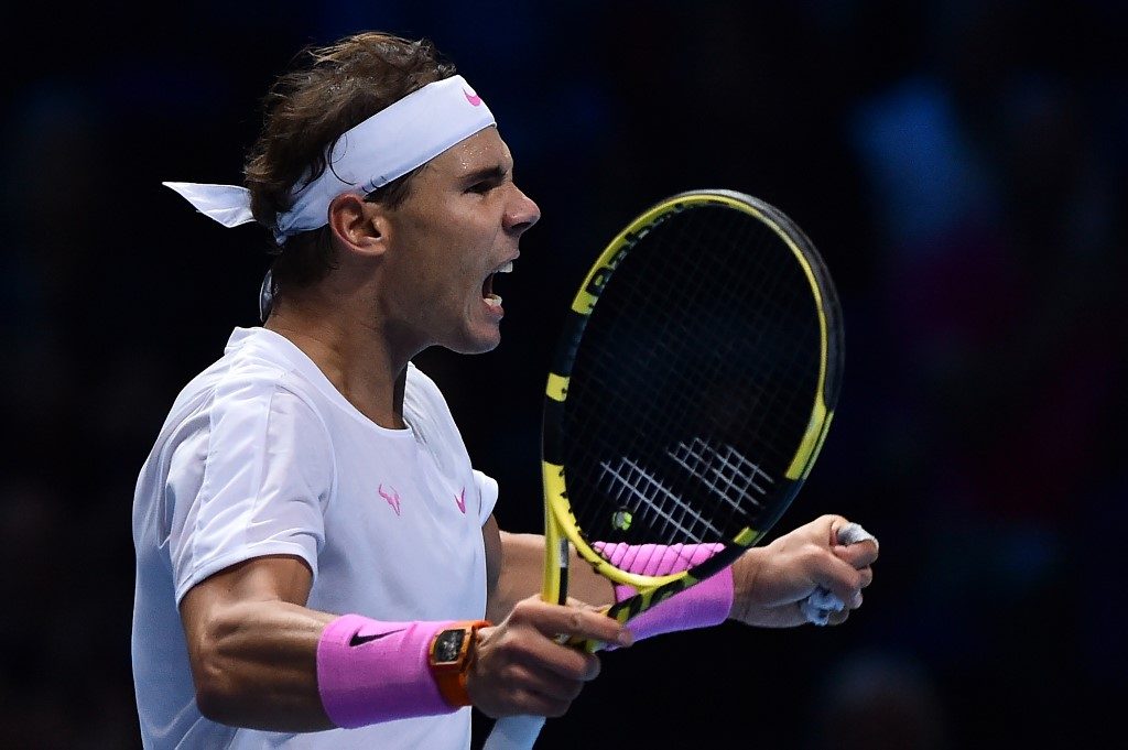 Nadal aims to keep heat on Federer Slams record