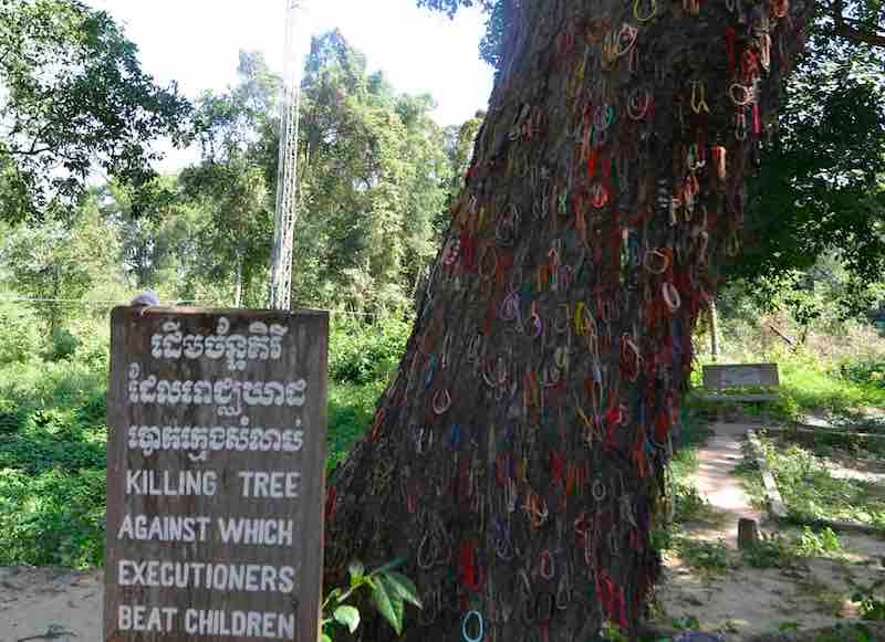KILLING TREE. This infamous Killing Tree in Choeung Ek was where Khmer Rouge soldiers would beat children, including infants, until they die. The soldiers would put a loudspeaker nearby so screams of victims won't be heard. Photo by Camille Elemia/Rappler  