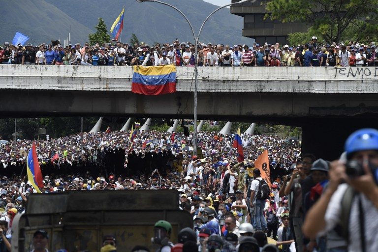 Venezuela protests rage, death toll hits 33