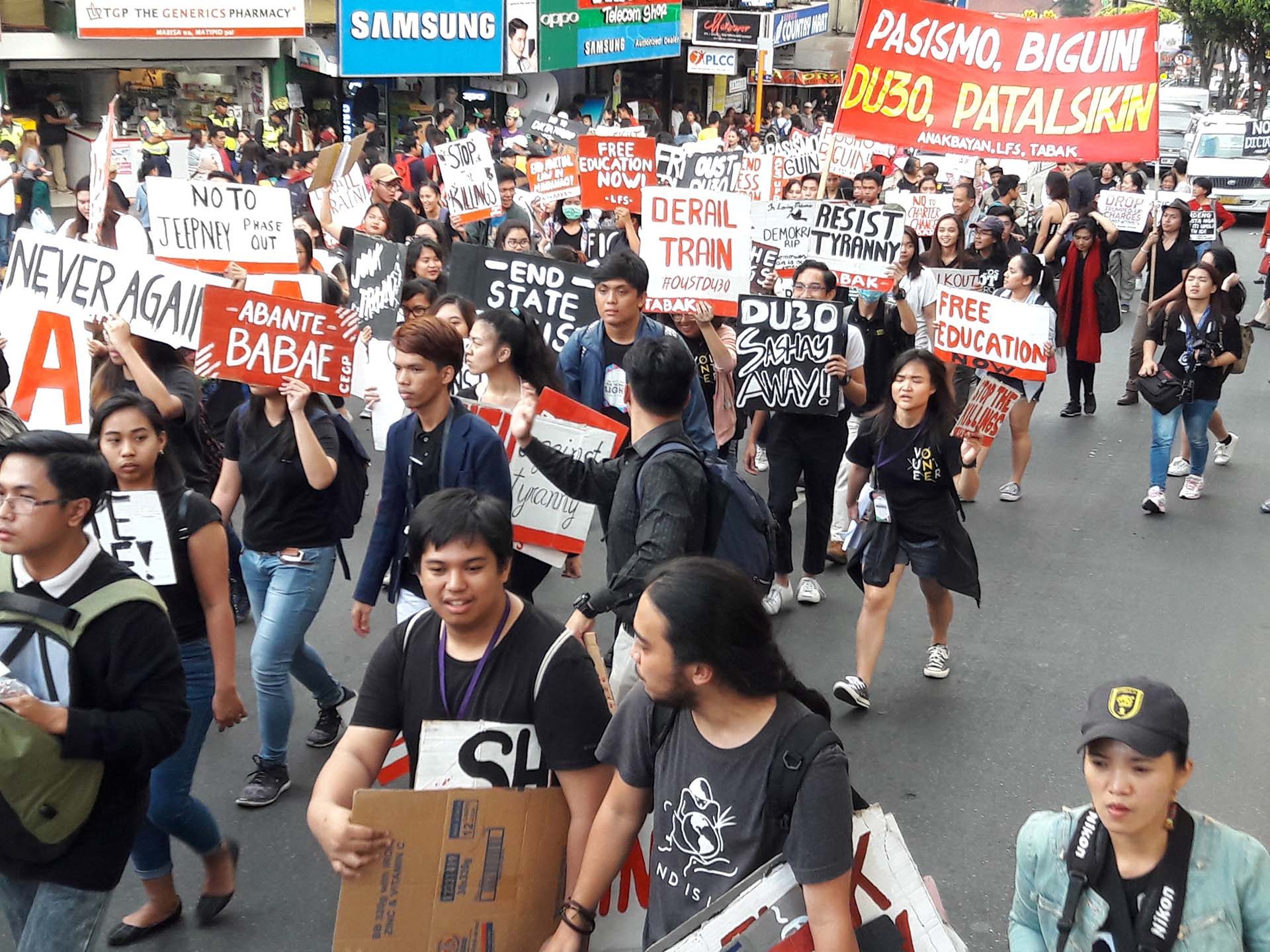 IN PHOTOS: Thousands join nationwide walkout vs Duterte