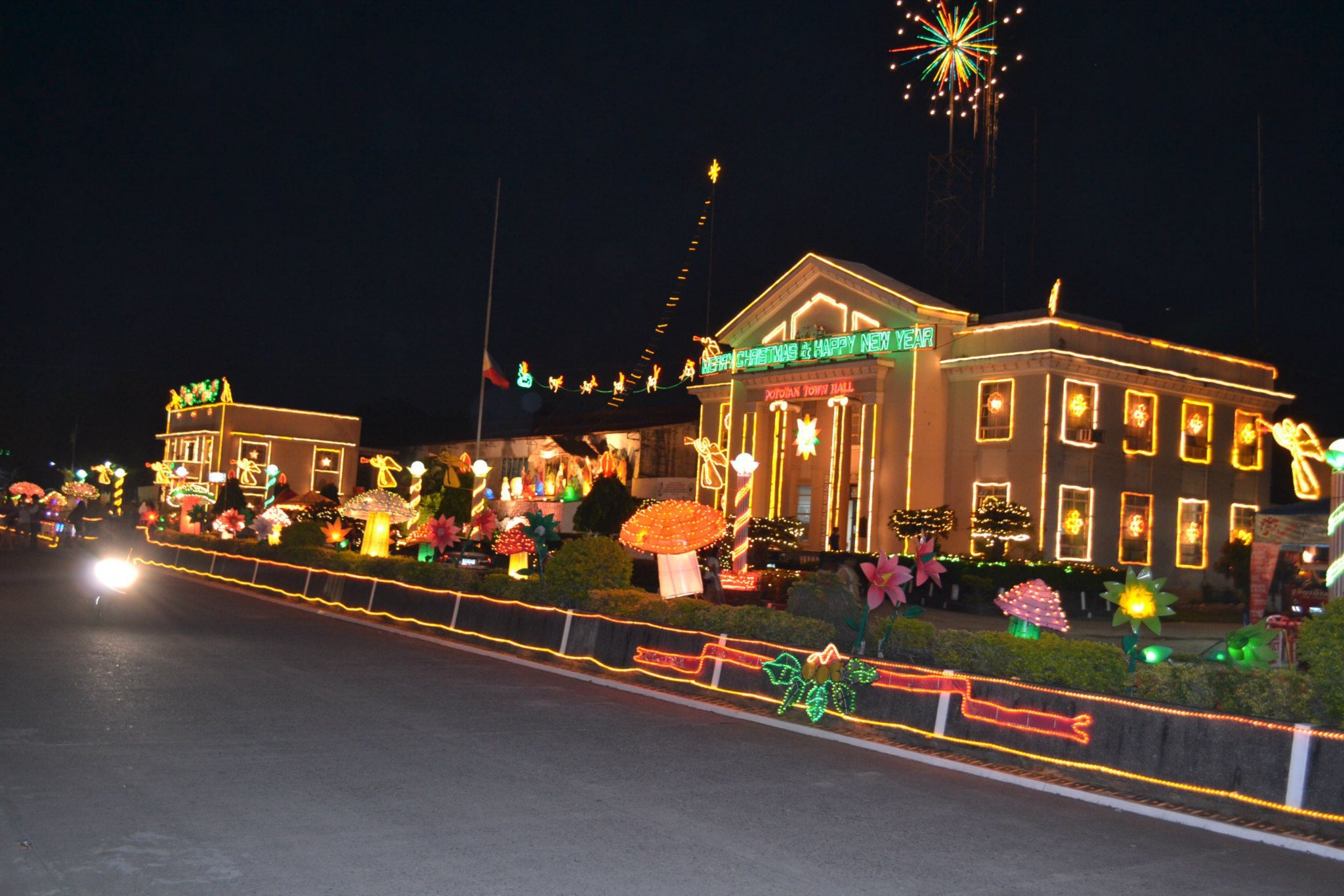 SHINING BUILDINGS. Around the plaza are buildings strung with lights, like the municipal hall. Photo courtesy of Discover Pototan Iloilo Facebook page 