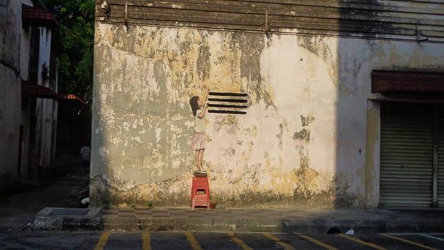 ON THE STREETS. Ipoh features different pieces of art on walls of old buildings, giving it life despite its decaying appearance 