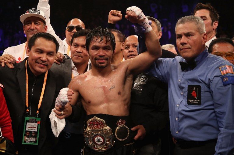After lopsided win, 40-year-old Pacquiao says career not over