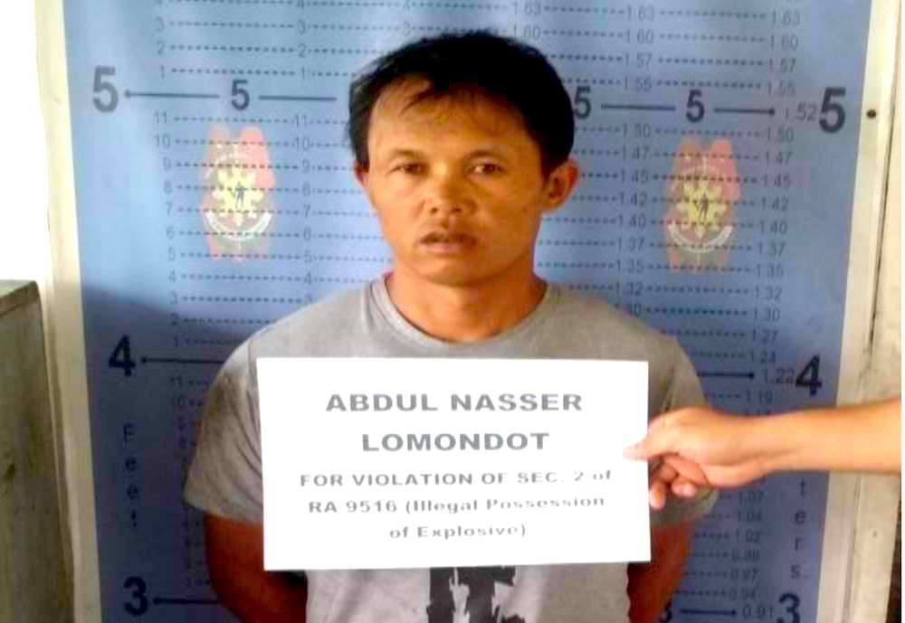 'MAUTE IN MANILA'. Police nab Abdul Nasser Lomondot along Recto Avenue in Manila City on Saturday, March 3. PNP photo 