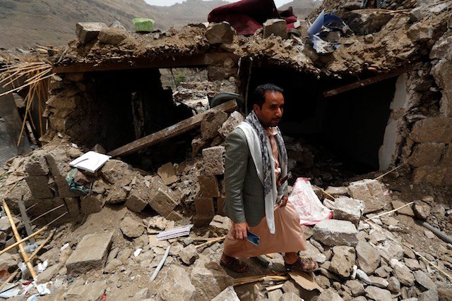 TARGETED. A Yemeni man walks through the rubble following an alleged airstrike of the Saudi-led coalition targeting Huthi rebels? positions in the village of Hajer Akash, Sanaa, Yemen, 04 April 2015. Yahya Arhab/EPA 