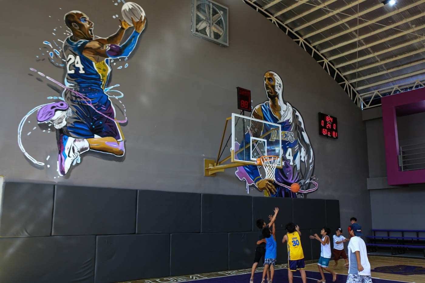 'KOBE FOR THREE'. Kids shoot hoops in front of Kobe Bryant's mural in the House of Kobe. Photo by Jire Carreon/Rappler 