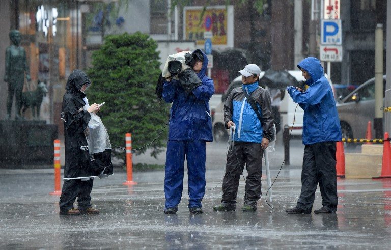 Hundreds of flights grounded as typhoon strikes near Tokyo