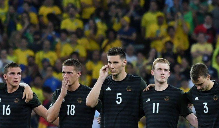 TO EXTRA TIME. Germany's midfielder Grischa Proemel, Germany's forward Nils Petersen, Germany's defender Niklas Suele, Germany's midfielder Julian Brandt and Germany's defender Lukas Klostermann wait ahead of a penalty shoot out following extra time during the Rio 2016 Olympic Games men's football gold medal match between Brazil and Germany at the Maracana stadium in Rio de Janeiro on August 20, 2016. Luis Acosta/AFP 