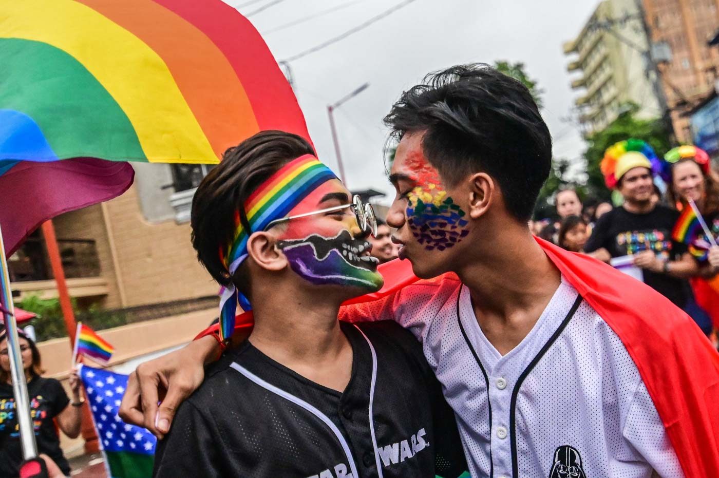 FREE TO LOVE. A couple express their love for each other during the 2019 Metro Manila Pride March at the Marikina Sports Center on Saturday, June 29. Photo by Alecs Ongcal/Rappler 