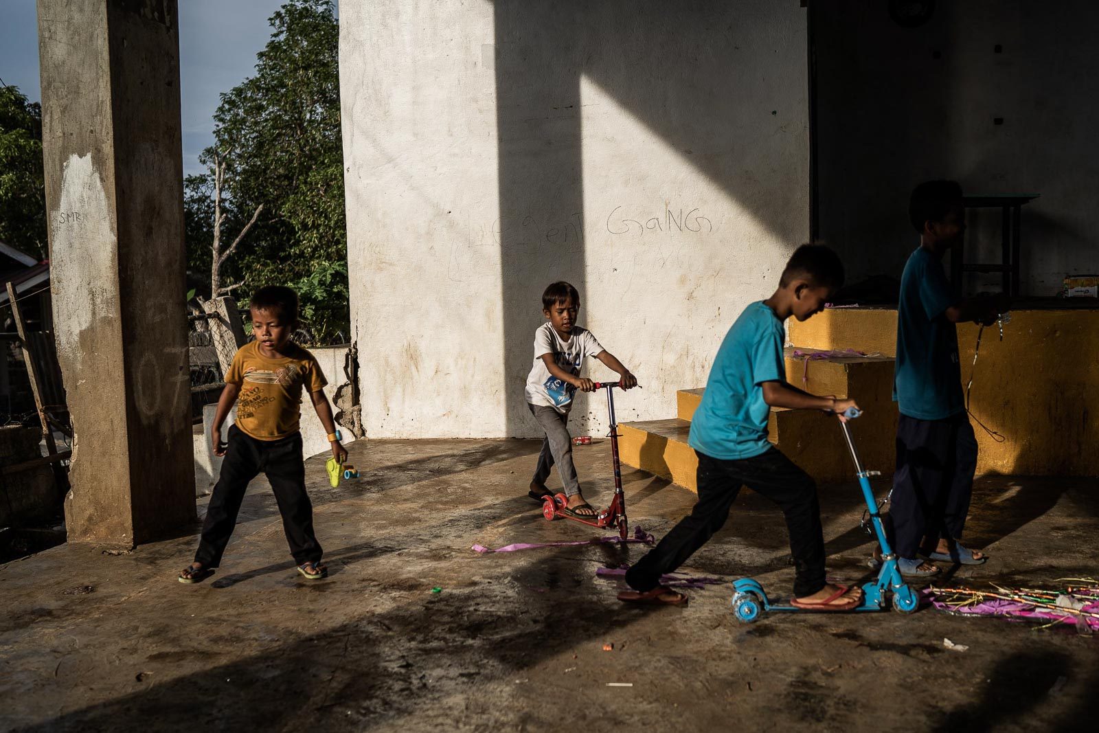 DEALING WITH TRAUMA. Children, some sons of rebel fighters, play with gifts in Basilan Island. Many of the ISIS fighters that came to Marawi in 2017, including its leader Isnilon Hapilon, were from this island. Photo by Martin San Diego