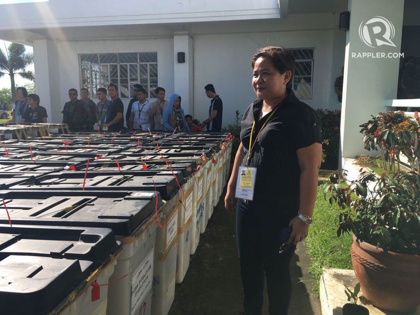 GUARDING THE VOTES. Sardillo stands beside the ballot boxes from Libmanan. Photo by OVP 