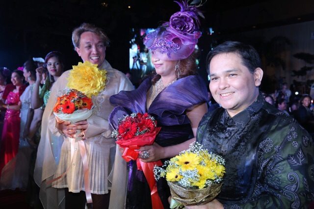 PINOY CREATIVITY. (L-R) Fashion show director Raymond Villanueva and designers Gina Frias and Joel Bautista are recognized after the fashion show. Photo courtesy Philippine Embassy in Kuala Lumpur, Malaysia 