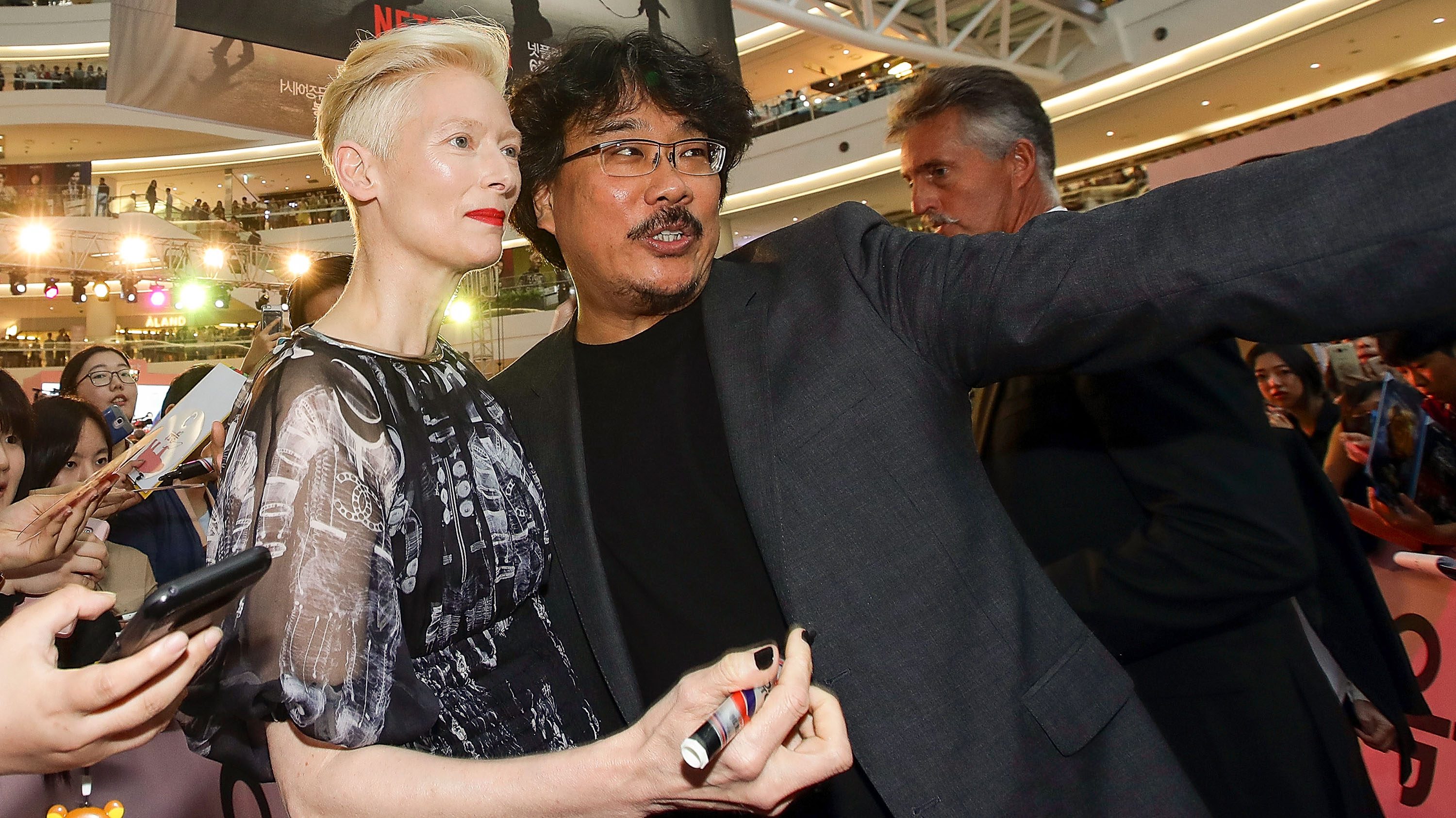 TILDA AND BONG. Tilda Swinton attends the Korean red carpet premiere of Netflix's 'Okja' with director Bong Joon-Ho. Photo by Chung Sung-Jun/Getty Images for Netflix  