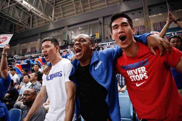 REJOICE. Reserves Gary David (left) and Troy Rosario (right) celebrate with Gilas in China. Photo from FIBA 