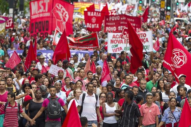 Crowds march against ‘coup’ targeting Brazil’s president