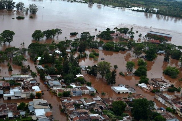 More than 160,000 evacuated in deadly Latin American floods