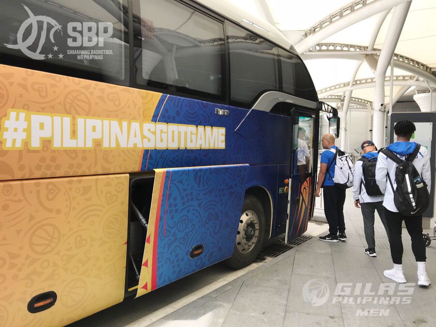 JOURNEY. Gilas Pilipinas boards the team bus to Foshan. Photo from Samahang Basketbol ng Pilipinas  